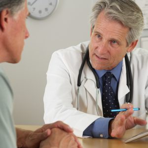 Doctor talking to patient