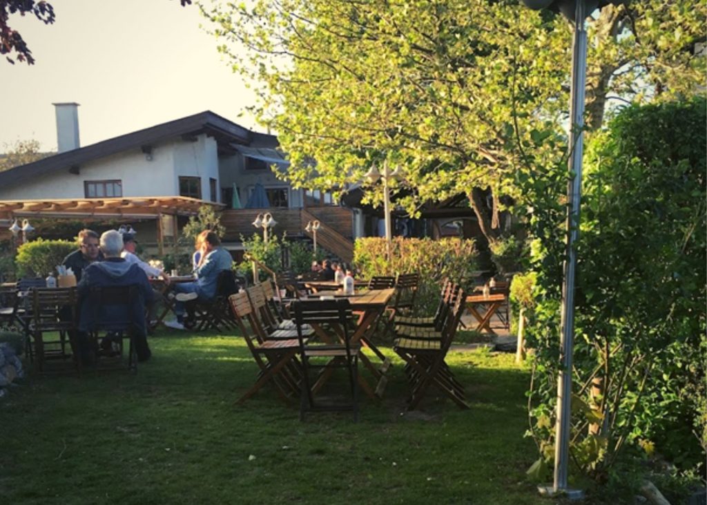 A leisurely garden drinking wine